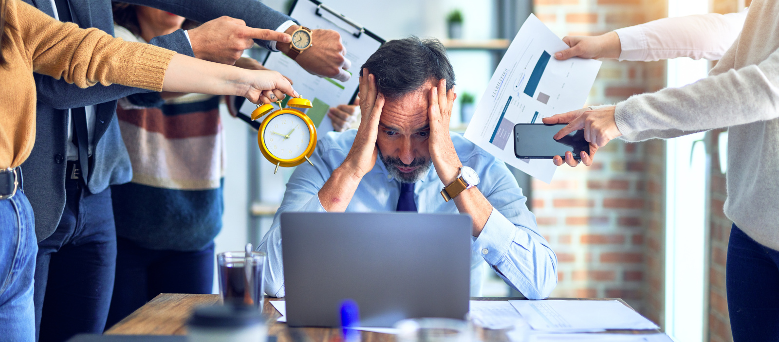 Stressed out recruitment consultant using outdated working methods