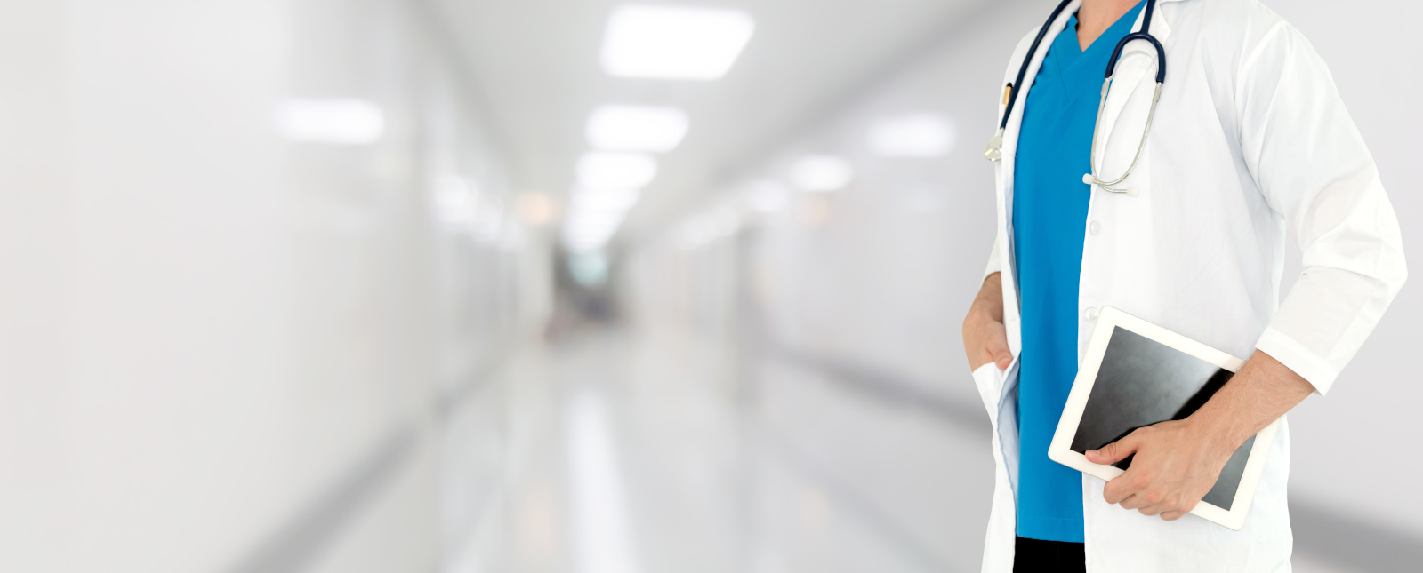 Doctor using tablet computer at the hospital.