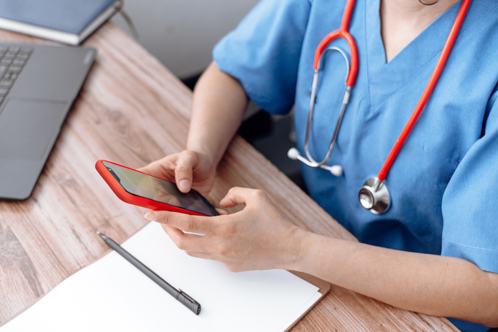Nurse using the WorkTracker workshift appointments app at desk