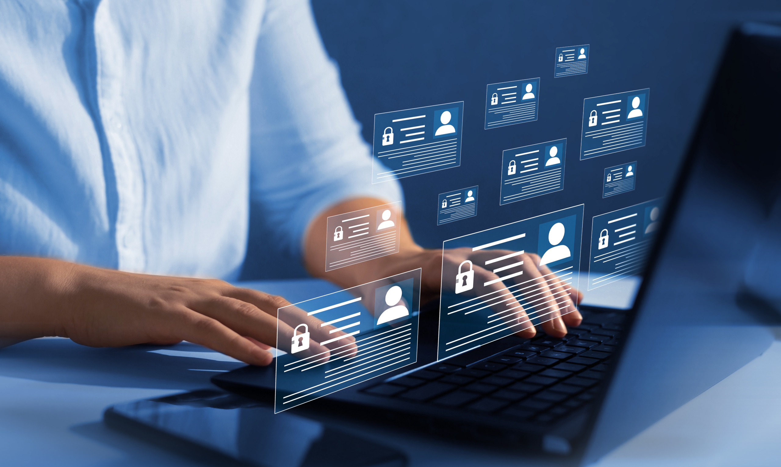 Employee confidentiality. Software for security, searching and managing corporate files and employee information. Concept image of recruitment consultant at laptop. Icons representing personal details for a compliant mobile workforce