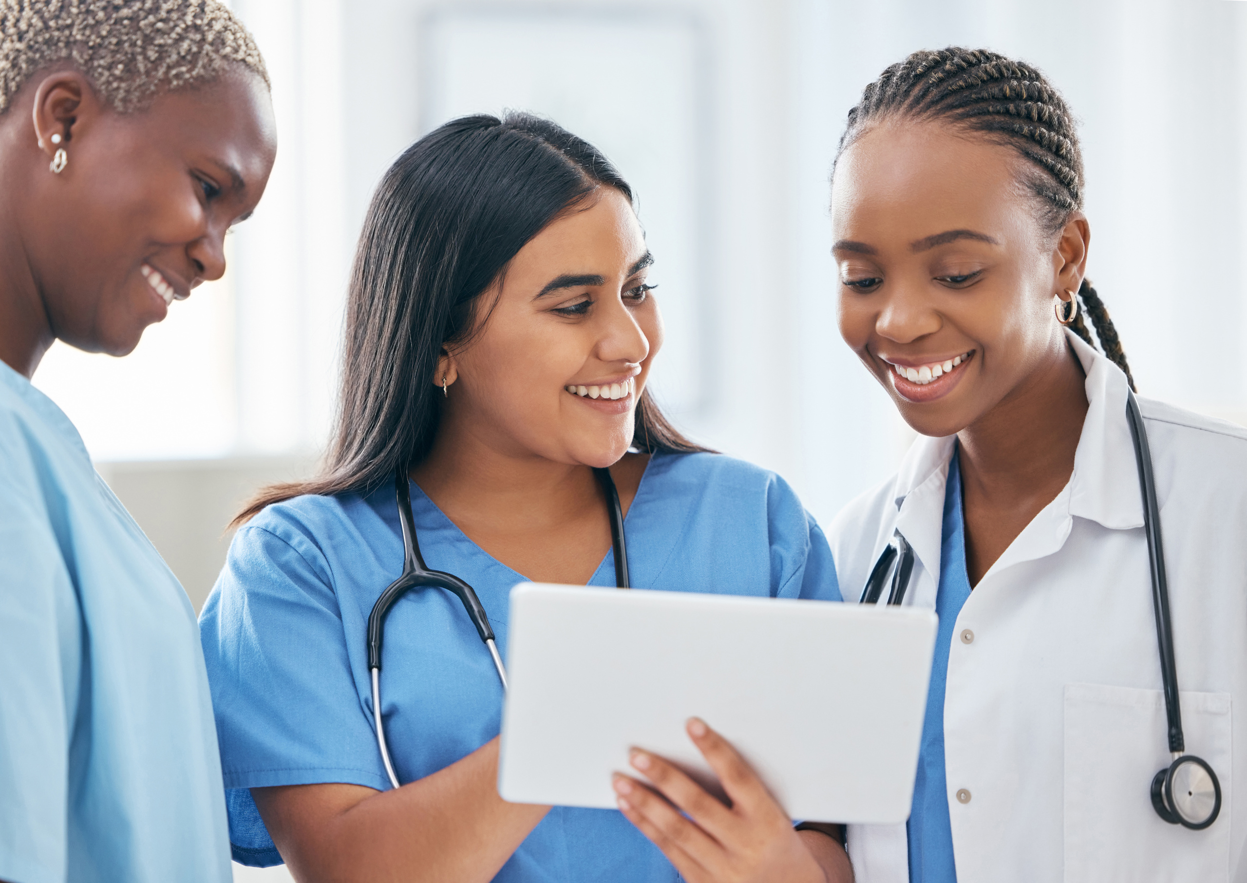 Happy female temporary healthcare staff holding a smart device: The YouRecruit and WorkTracker workforce management system