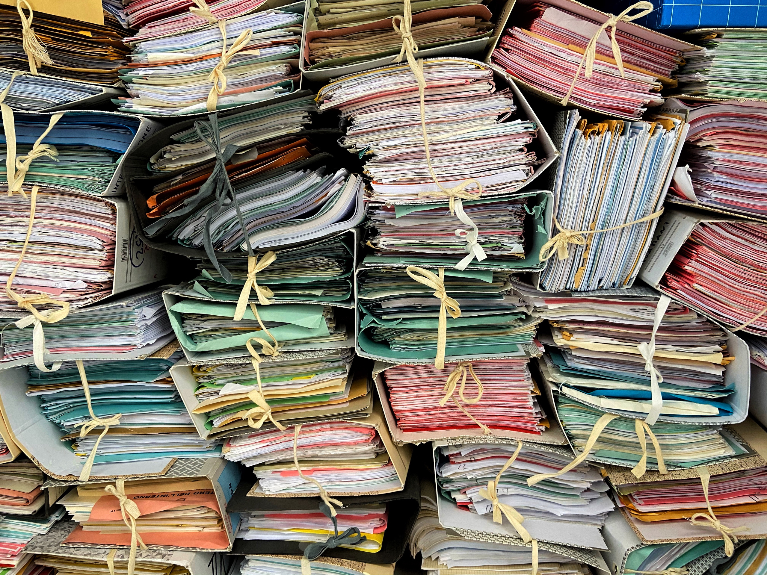Image of old paperwork filing system signifying outdated systems: The YouRecruit recruitment agency timesheet software