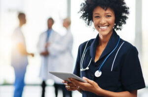 A fully compliant nurse with tablet in hospital: Compliance management with the YouRecruit workforce management system