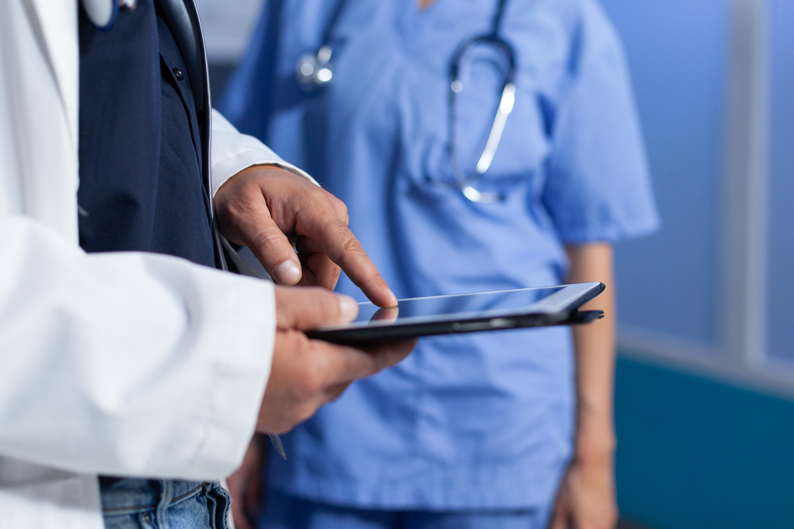 Doctor having their timesheet approved and signed off at shift end: The WorkTracker agency timesheet software